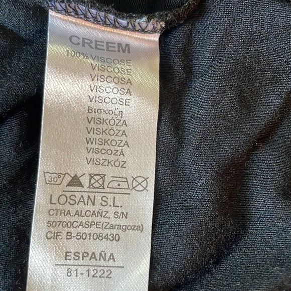 Black shirt. With straps that criss cross in the back. Sz small - Picture 5 of 7